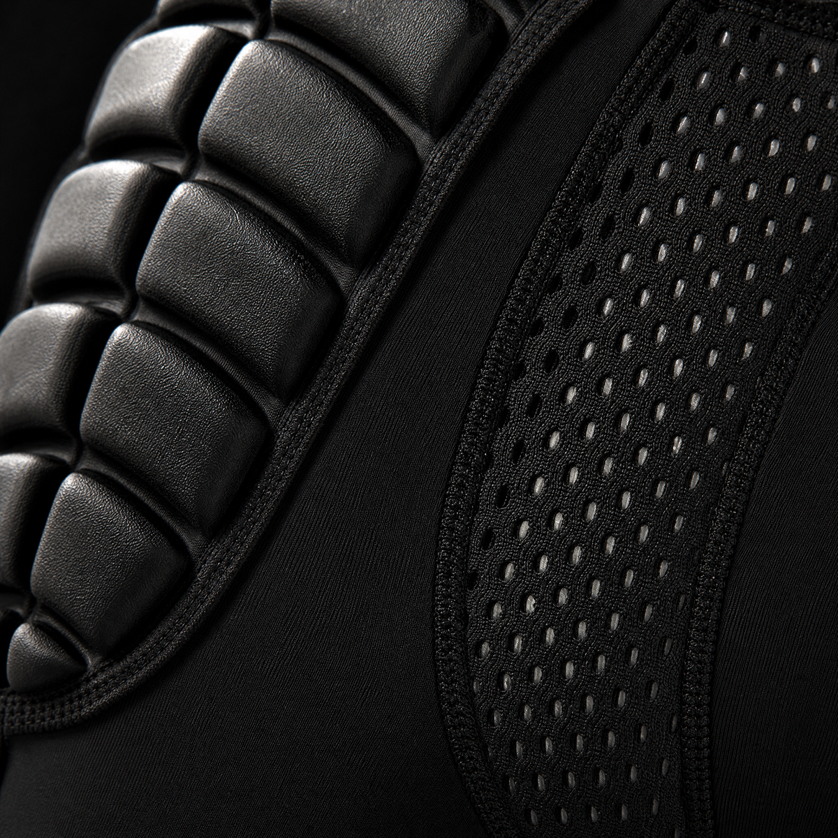 Close-up detail of impact shorts padding and mesh